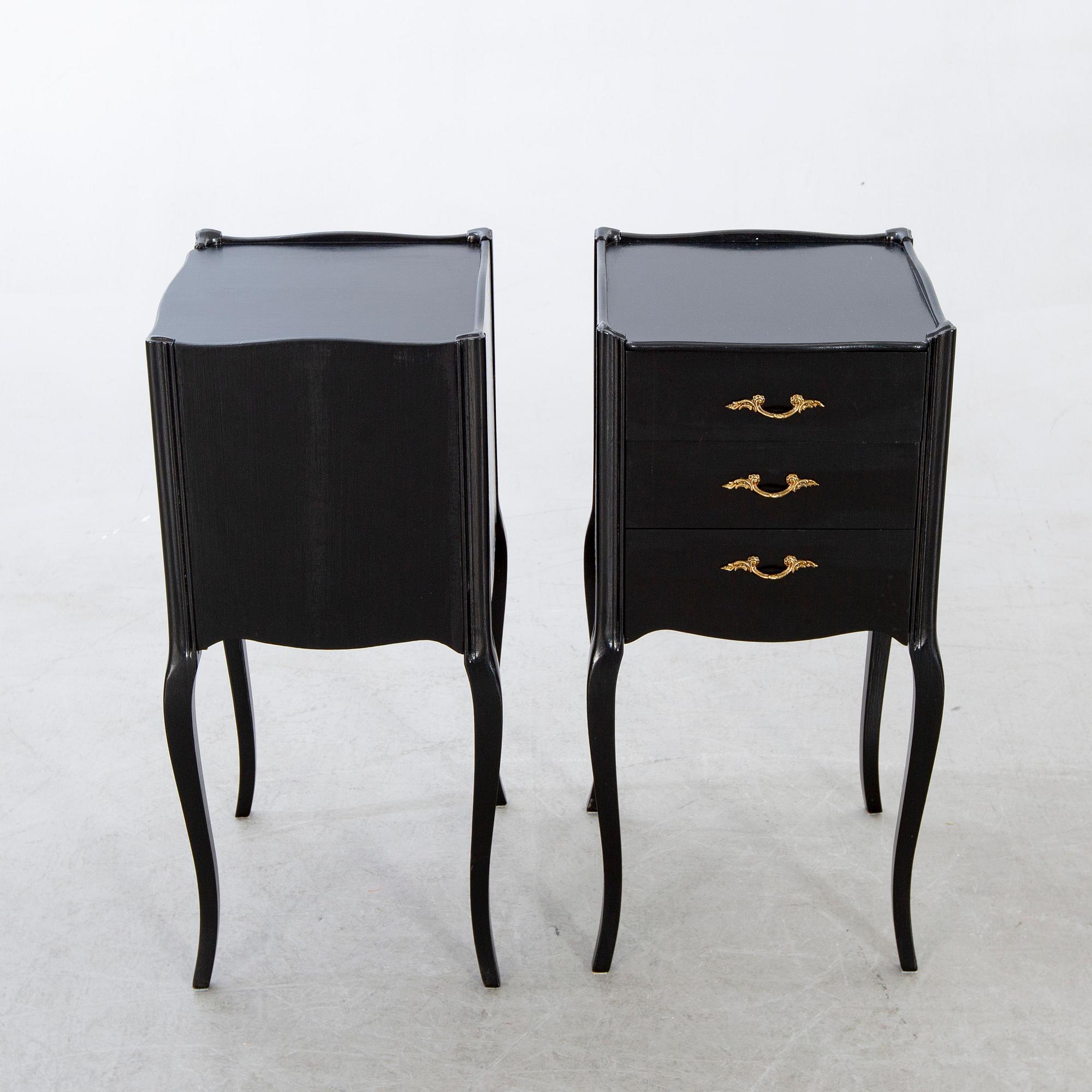 A pair of Rococo-style bedside tables later part of the 20th century.