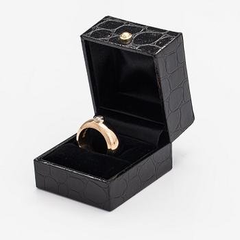 An 18K gold ring with a ca. 0.22 ct diamond. B. Ahlfors, Helsinki 1971.