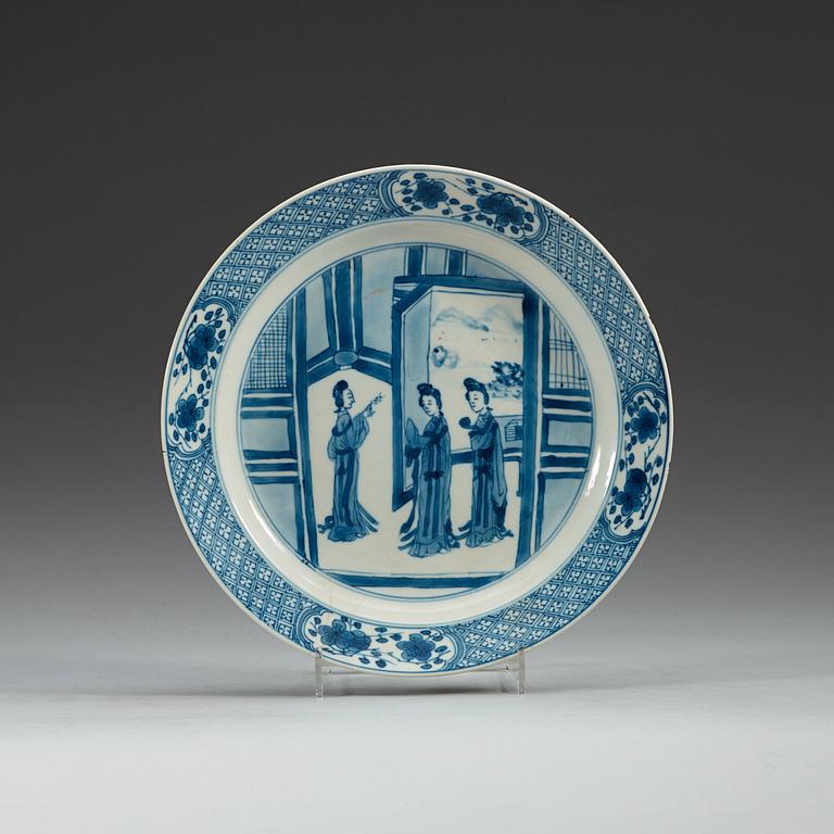 A set of four odd blue and white dinner plates, Qing dynasty, Kangxi (1662-1722), with different six character marks.