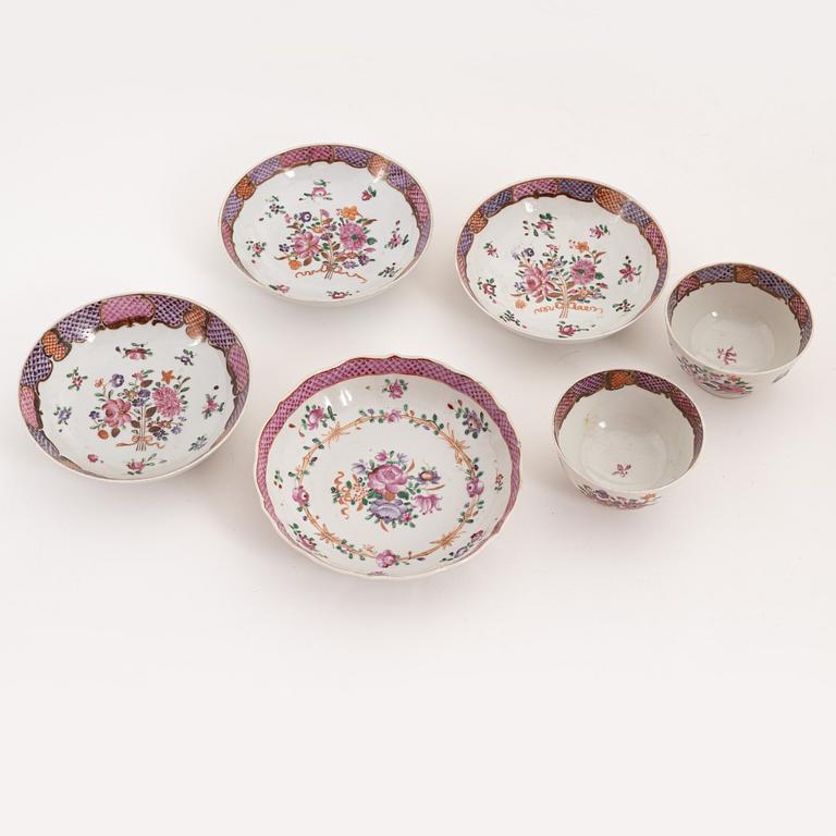 A group of seven famille rose cups with saucers, two bowls and two small dishes, Qing dynasty, Qianlong (1736-95).