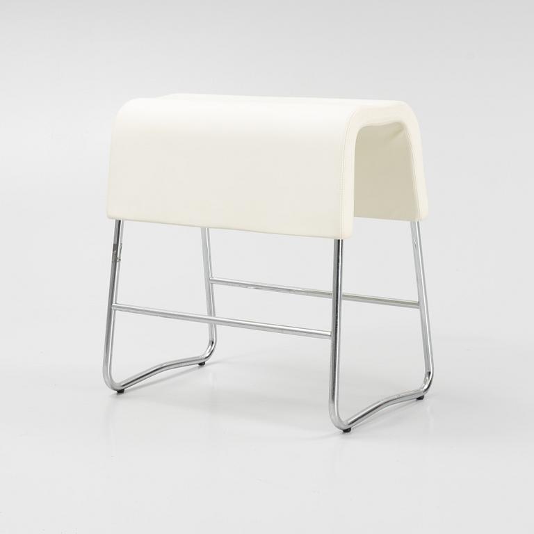 A leather upholstered stool by Sandin och Bülow for Materia 2001.