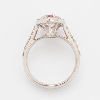An 18K gold ring set with a faceted morganite.