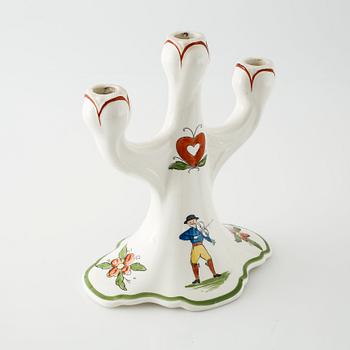 A candelabrum in ceramic named "Daldansen", Rörstrand, from early 20th century.