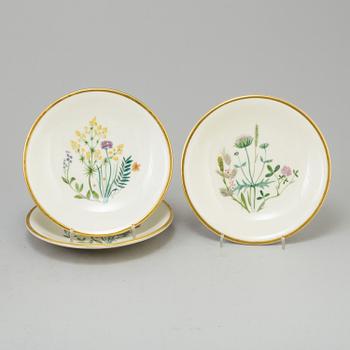 A set of 15 porcelain plates from Nordiska Kompaniet, first half 20th century.