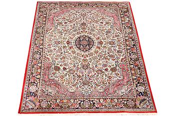 A Quum rug, c. 204 x 134 cm.