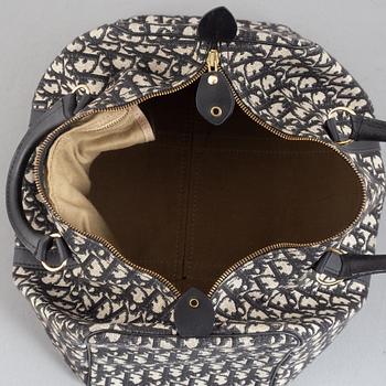 Christian Dior, a weekend bag.