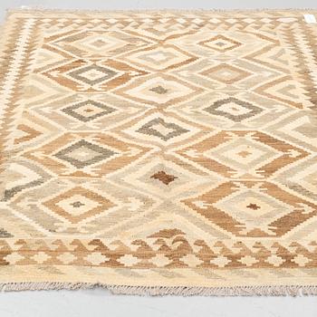 A rug, kilim, around 199 x 157 cm.
