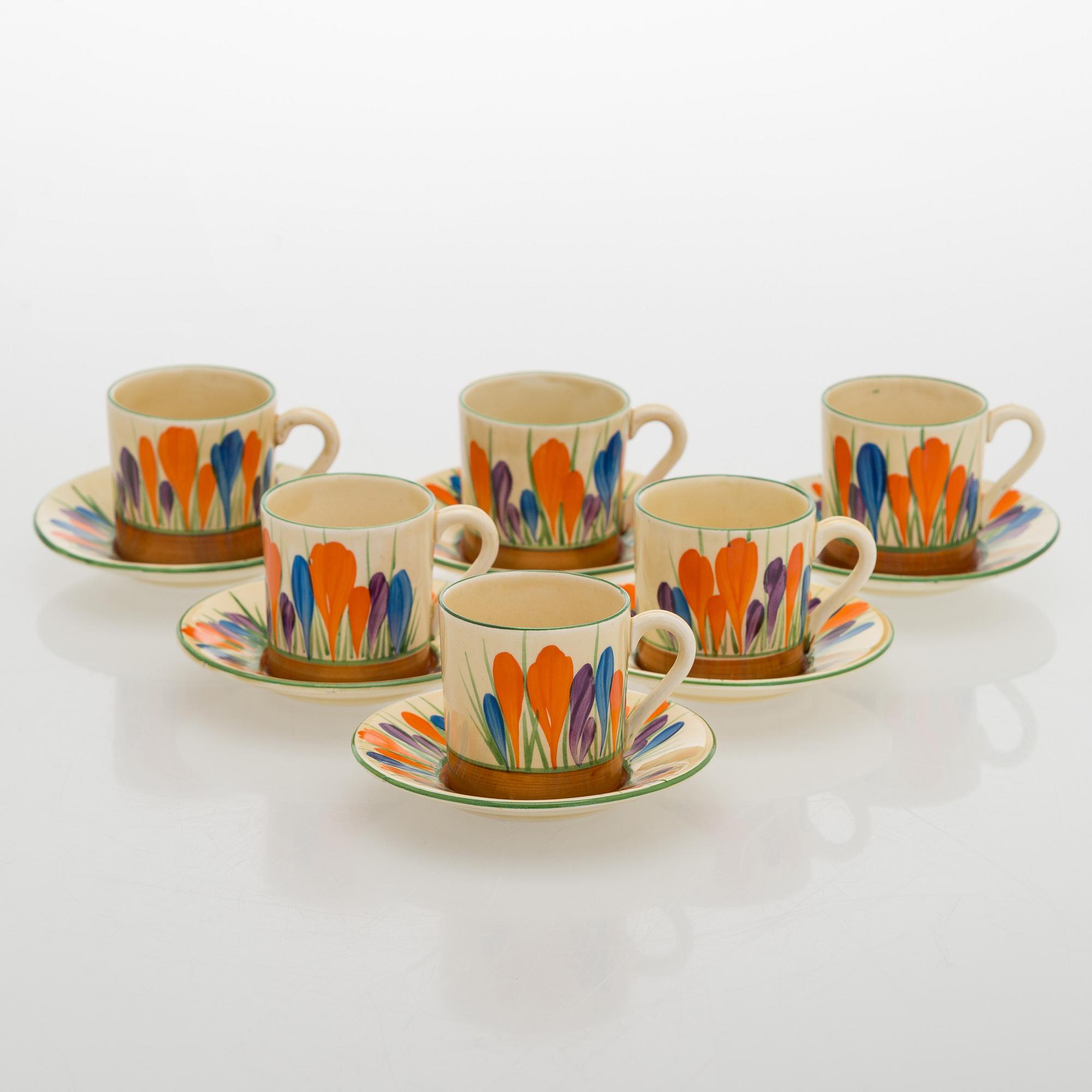 Clarice Cliff, 10-piece coffee service, stamped "Crocus", England.