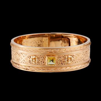 A bracelet with a synthetic yellow stone. French hallmarks and Swedish import marks.