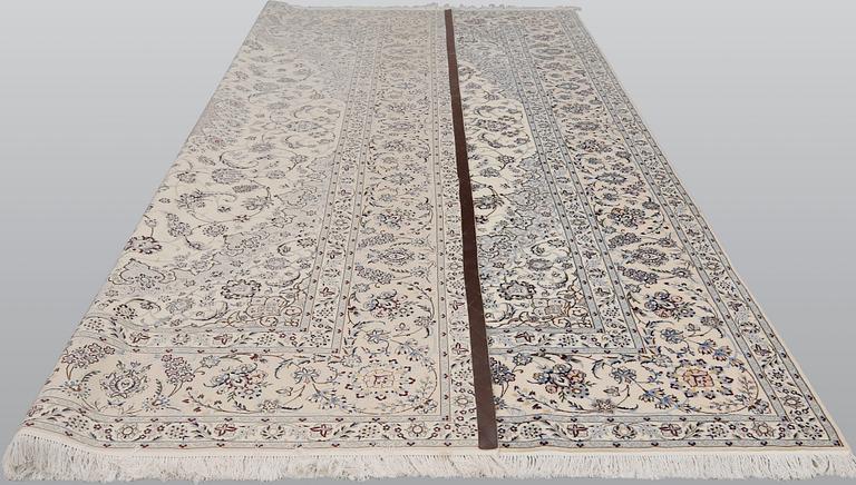 A Nain part silk carpet, 408 x 308 cm.
