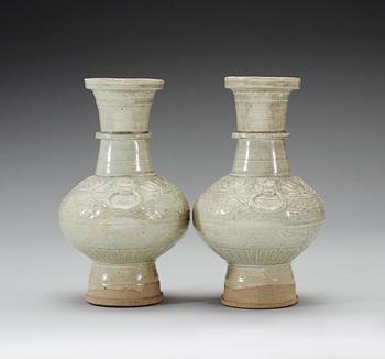 A pair of pale celadon glazed vases, Song/Yuan dynasty.