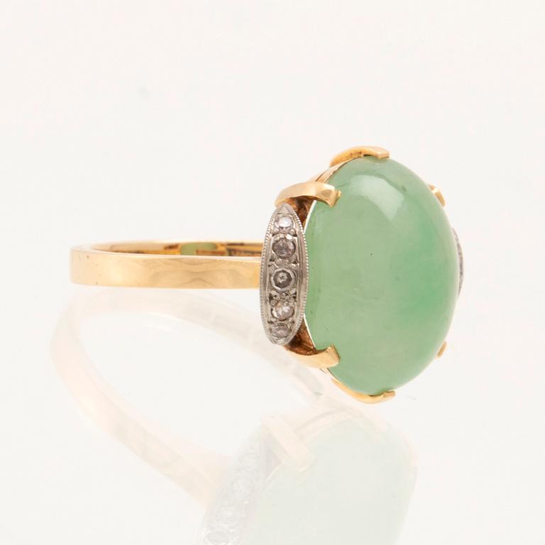 Börje Löfgren, ring in 18K white and red gold with an oval cabochon-cut jadeite and single-cut diamonds, Stockholm 1964.