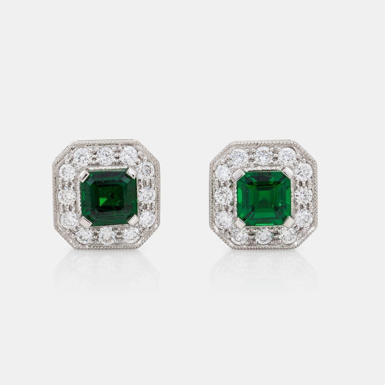 A pair of Asscher-cut tsavorite and brilliant-cut diamond earrings.
