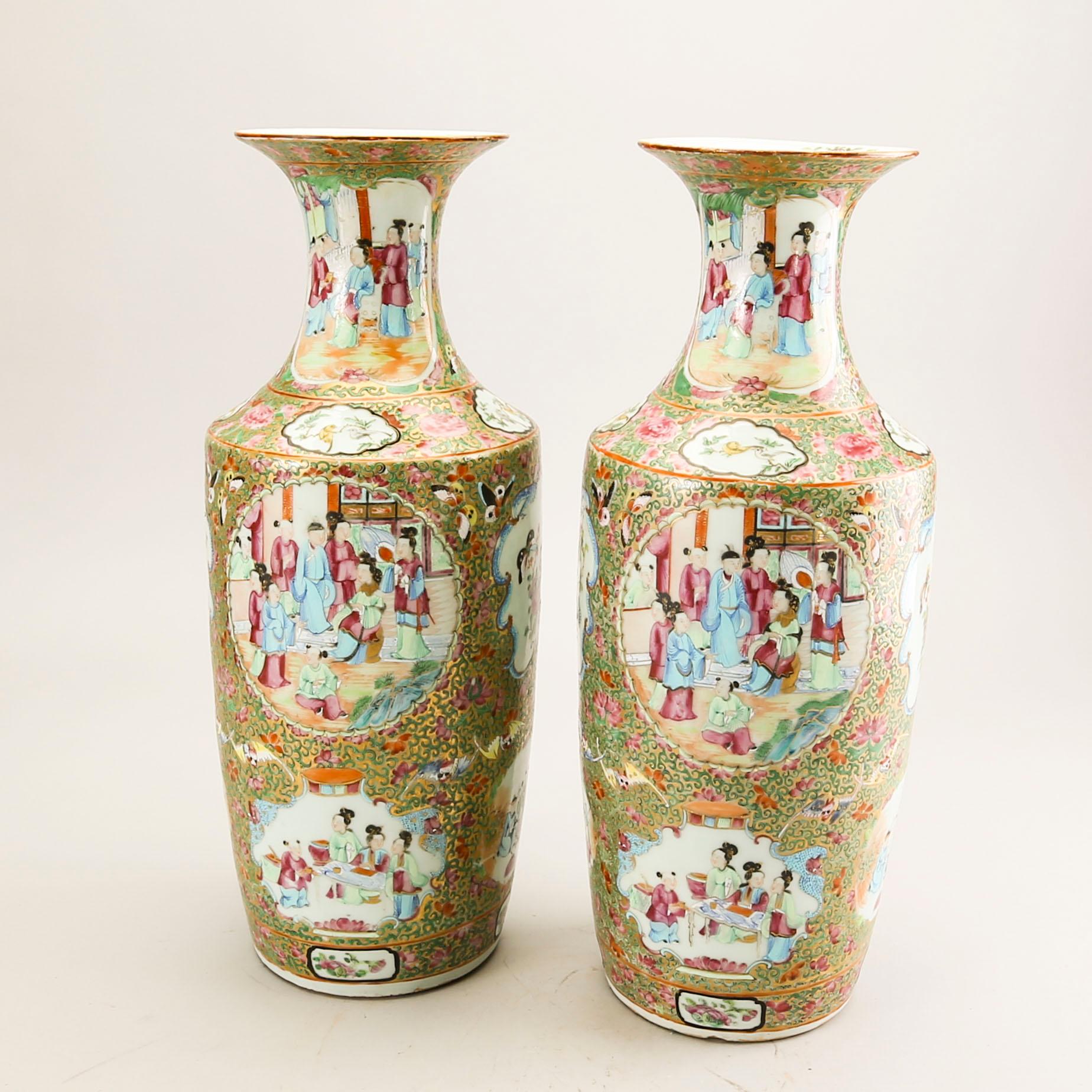 A pair of Chinese kanton vases later part of the 19th century porcelain.