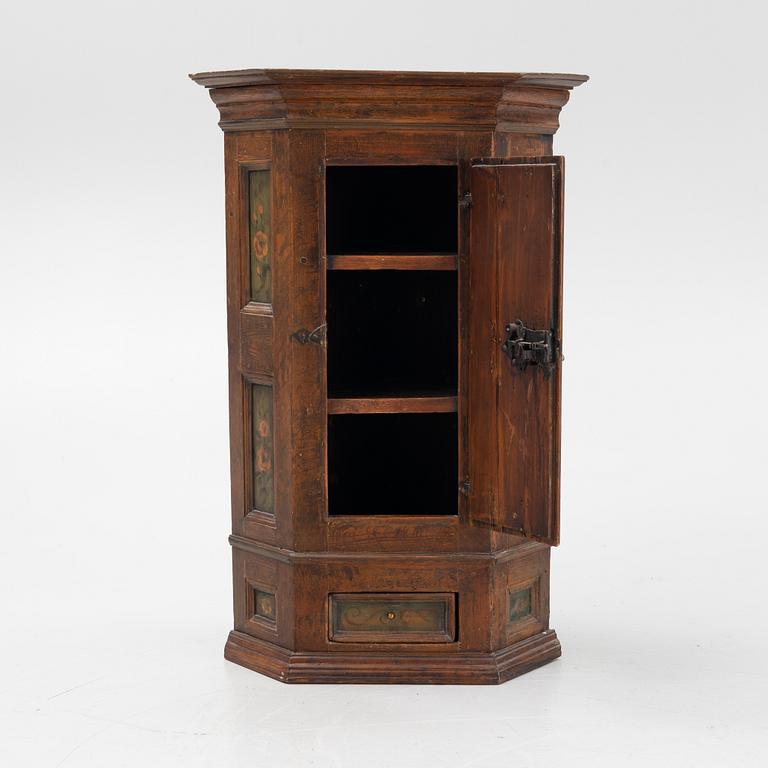 A Swedish provincial pine cabinet, dated 1770.