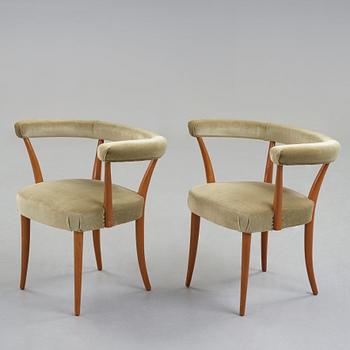 Josef Frank, a pair of mahogany horseshoe chairs, Svenskt Tenn, Sweden, mid 20th Century, model 966.