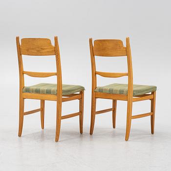 Carl Malmsten, a dining table and four chairs, 'Calmare nyckel', Åfors Möbelfabrik, second half of the 20th century.