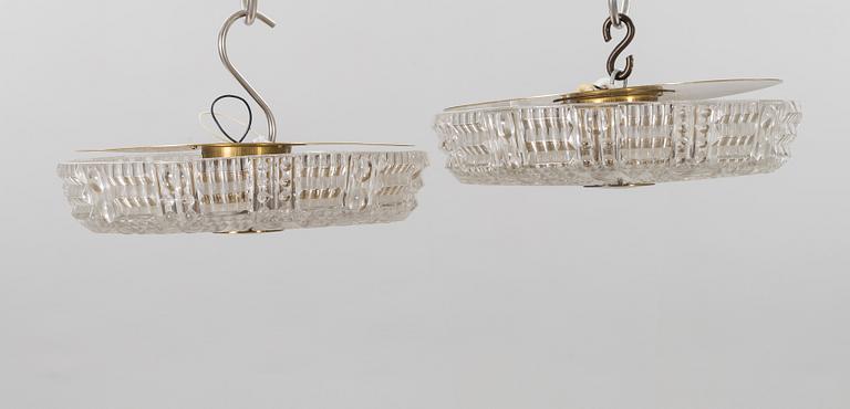 A PAIR OF CARL FAGERLUND CEILING LAMPS.