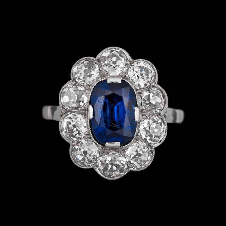 A sapphire and old-cut diamonds app. tot. 2.50 cts.