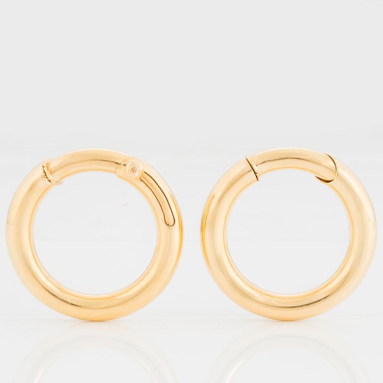 A pair of Cartier earrings.