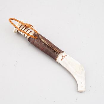 Lars Pirak, a Sami reindeer horn knife, signed Lars Pirak.