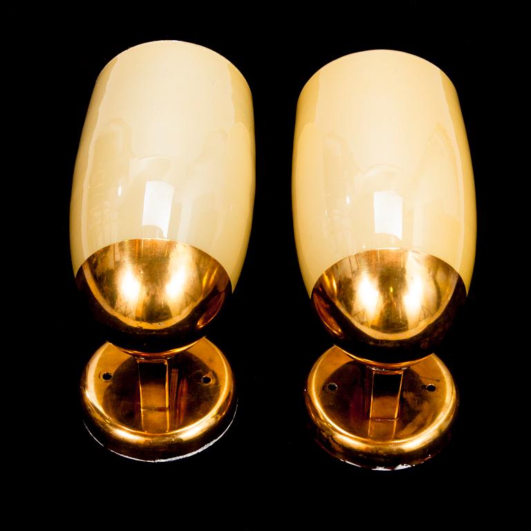 PAAVO TYNELL, a pair of mid 20th century wall lights for Idman. Finland.
