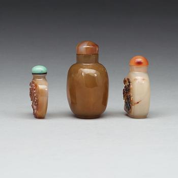 Three Chinese agathe snuff bottles, 20th Century.