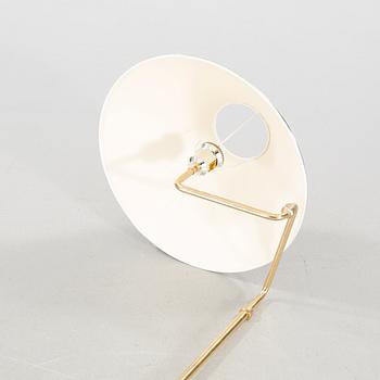 A pair of floor lamp from the latter half of the 20th century.