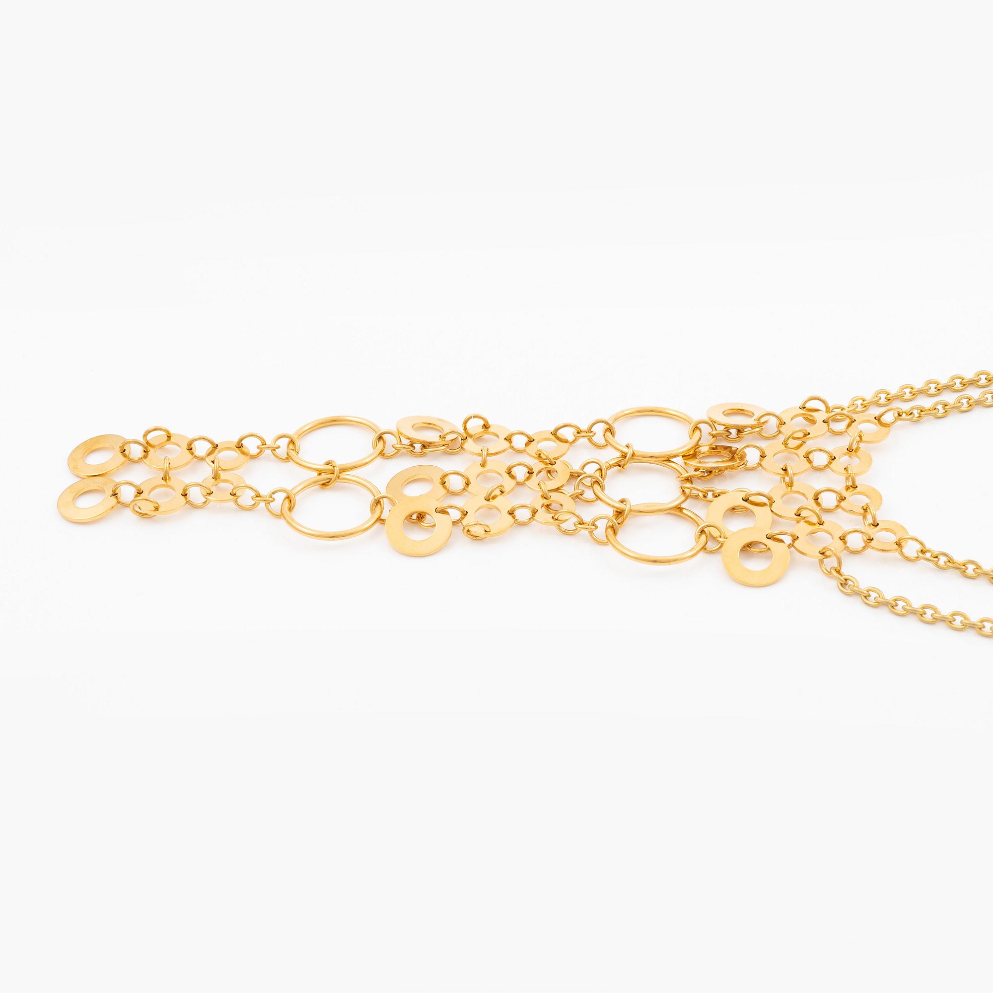 Siv Lagerström two necklaces in yellow metal.