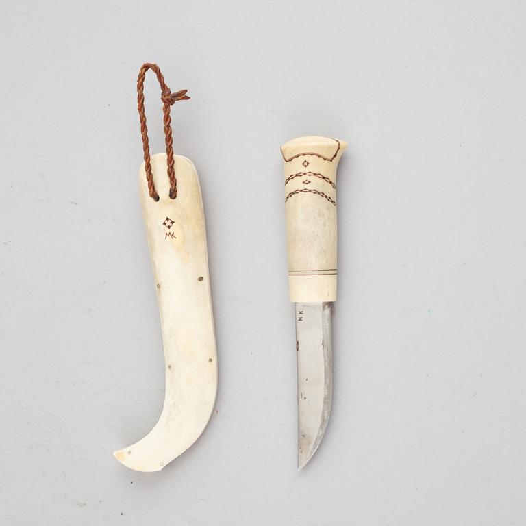 Martin Kuorak, a Sami reindeer horn knife, signed.