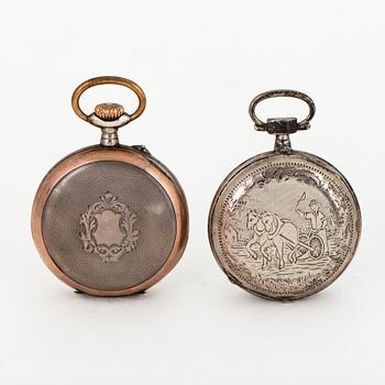 TWO POCKET WATCHES WITH STANDS.