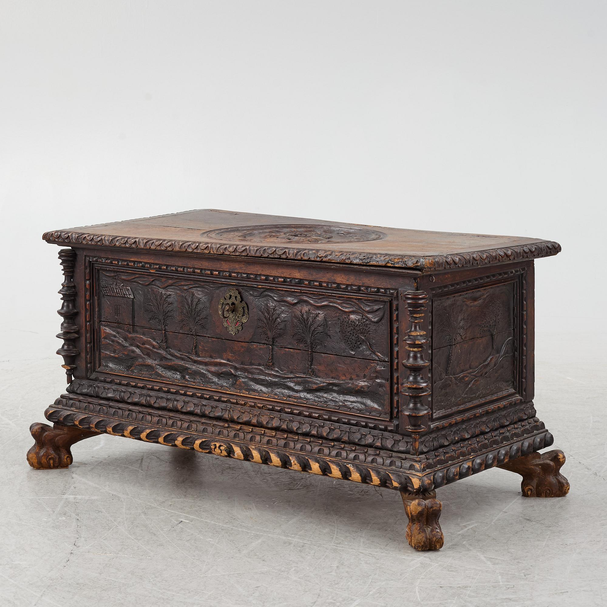 A baroque style wooden chest, 19th century.