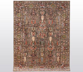A rug, Zieglar design, ca 244 x 180 cm.