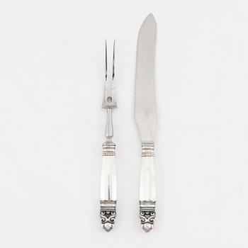 Johan Rohde, A sterling silver carving knife and fork set, 'Konge/Acorn', Georg Jensen, Denmark.