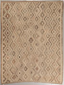 A kelim rug. C. 275 x 215 cm.