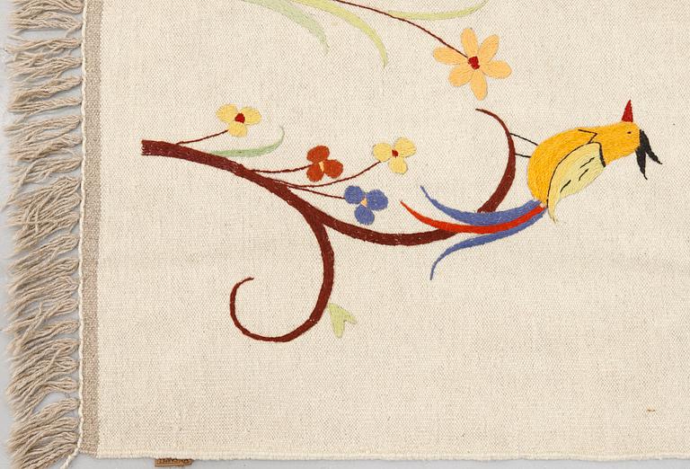 An embroided oriental flat weave carpet, circa 225 x 175 cm.