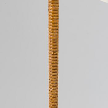 Paavo Tynell, a mid-20th century K10-10 floor lamp for Taito.