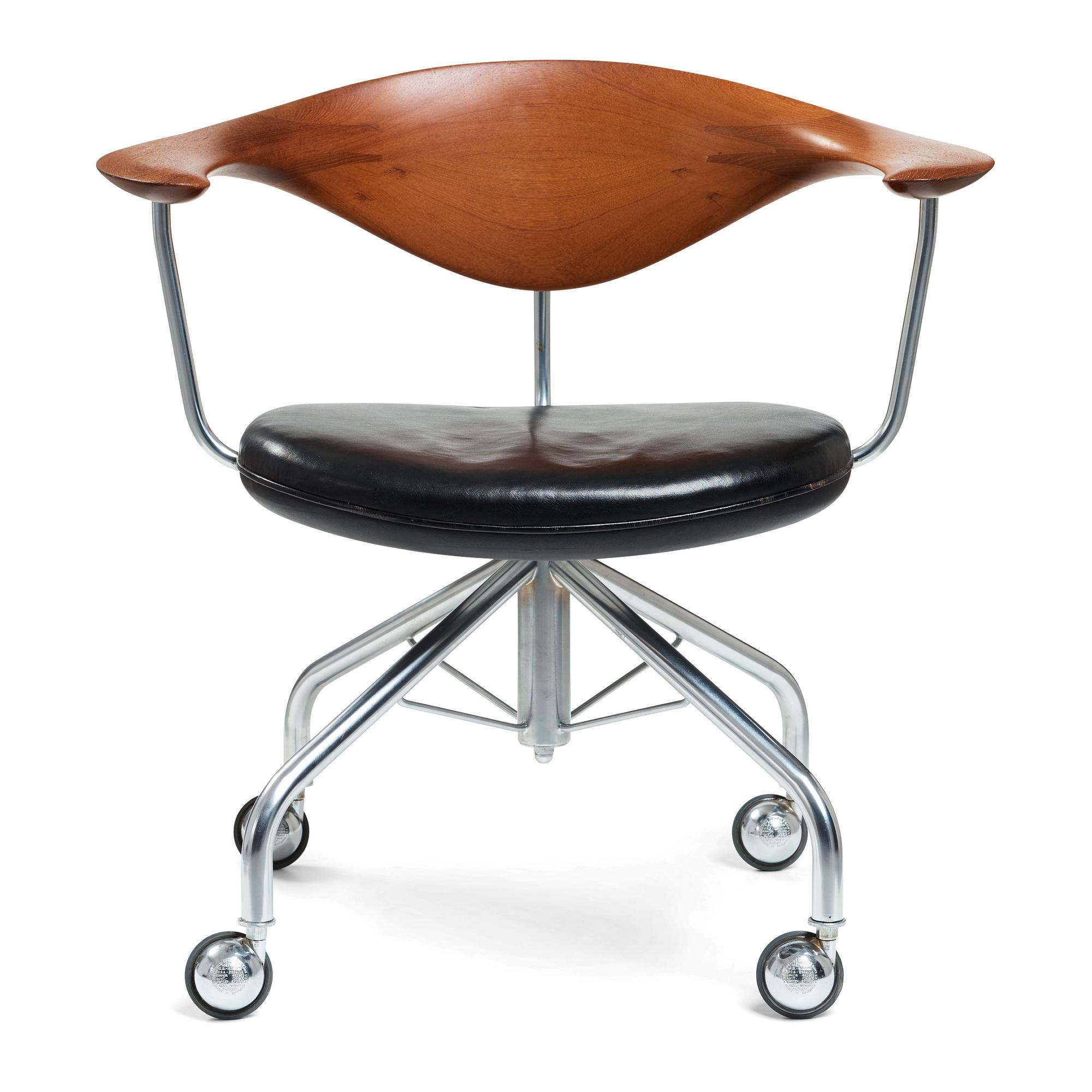 Hans J. Wegner, a "Swivel Chair" /JH502, executed by Johannes Hansen, Denmark 1960's.
