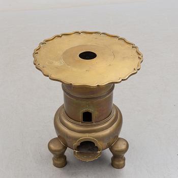 A Chinese brass stove, Qing, circa 1900.