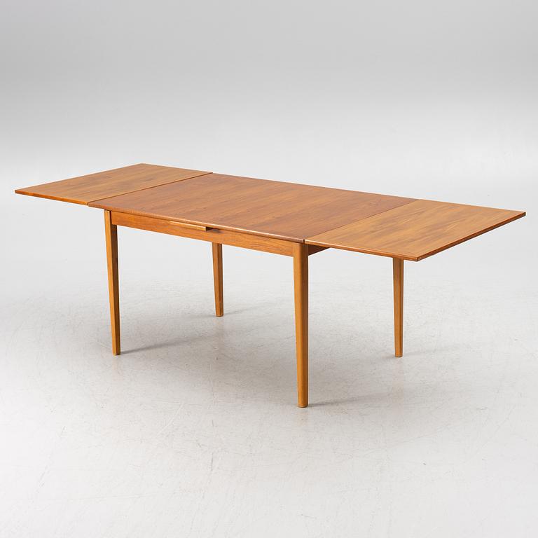A dining table, teak, 1960s.