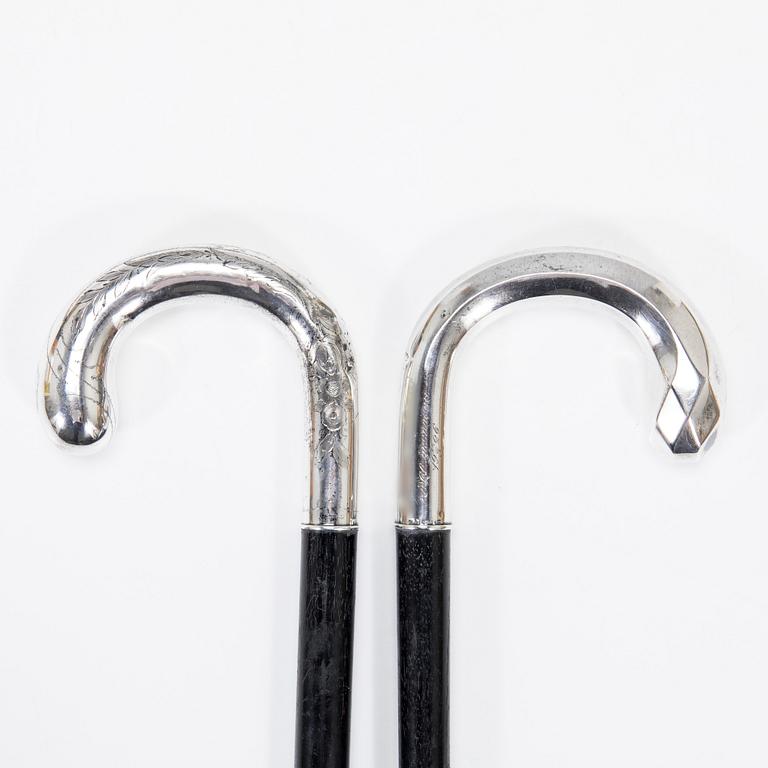 Two 1920s walking sticks with silver handles and ferrules. Finnish and Swedish control marks.