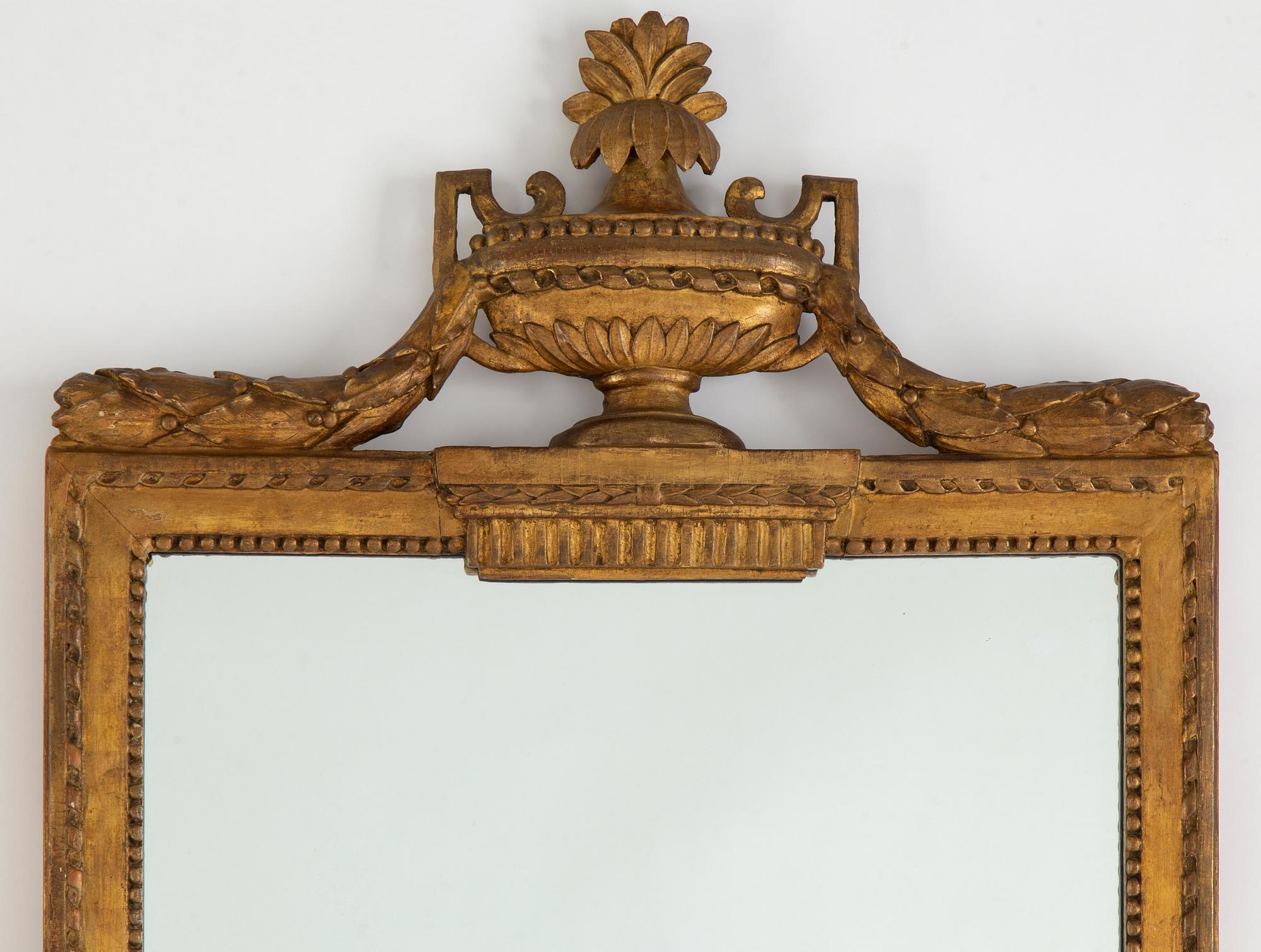 A Gustavian mirror, late 18th century.