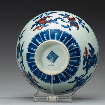 A blue, white and red bowl, late Qing dynasty with Qianlong seal mark.