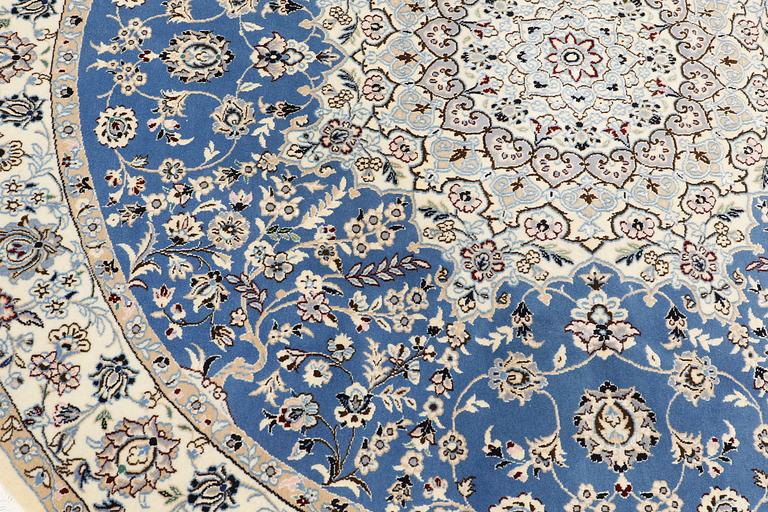 A round part silk Nain rug, so called 9 LAA, diameter 195 cm.