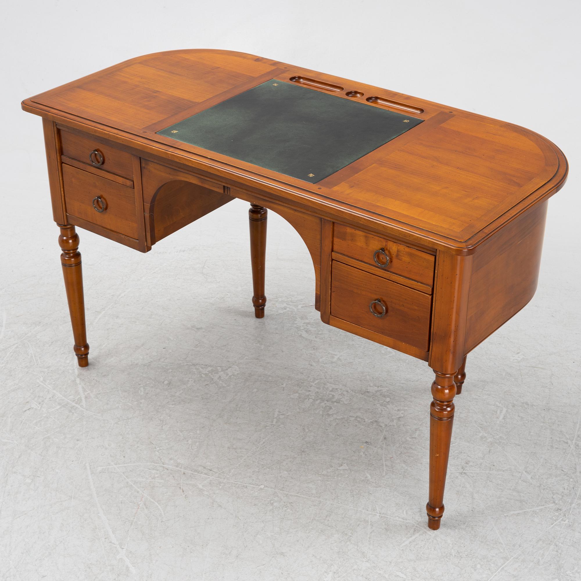 A Cherry wood desk, mid 20th century.