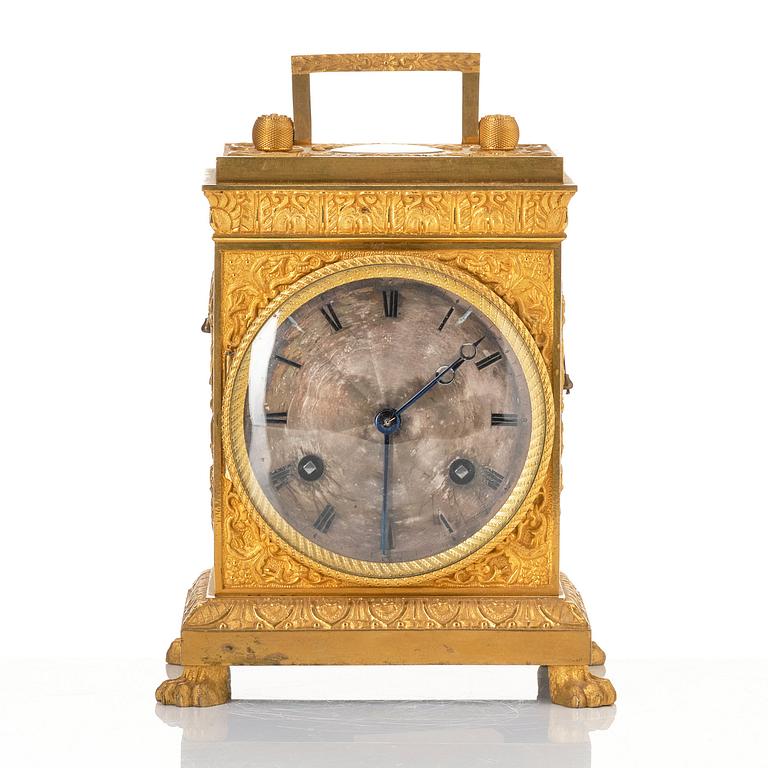 A late empire mantel clock, mid 19th century.