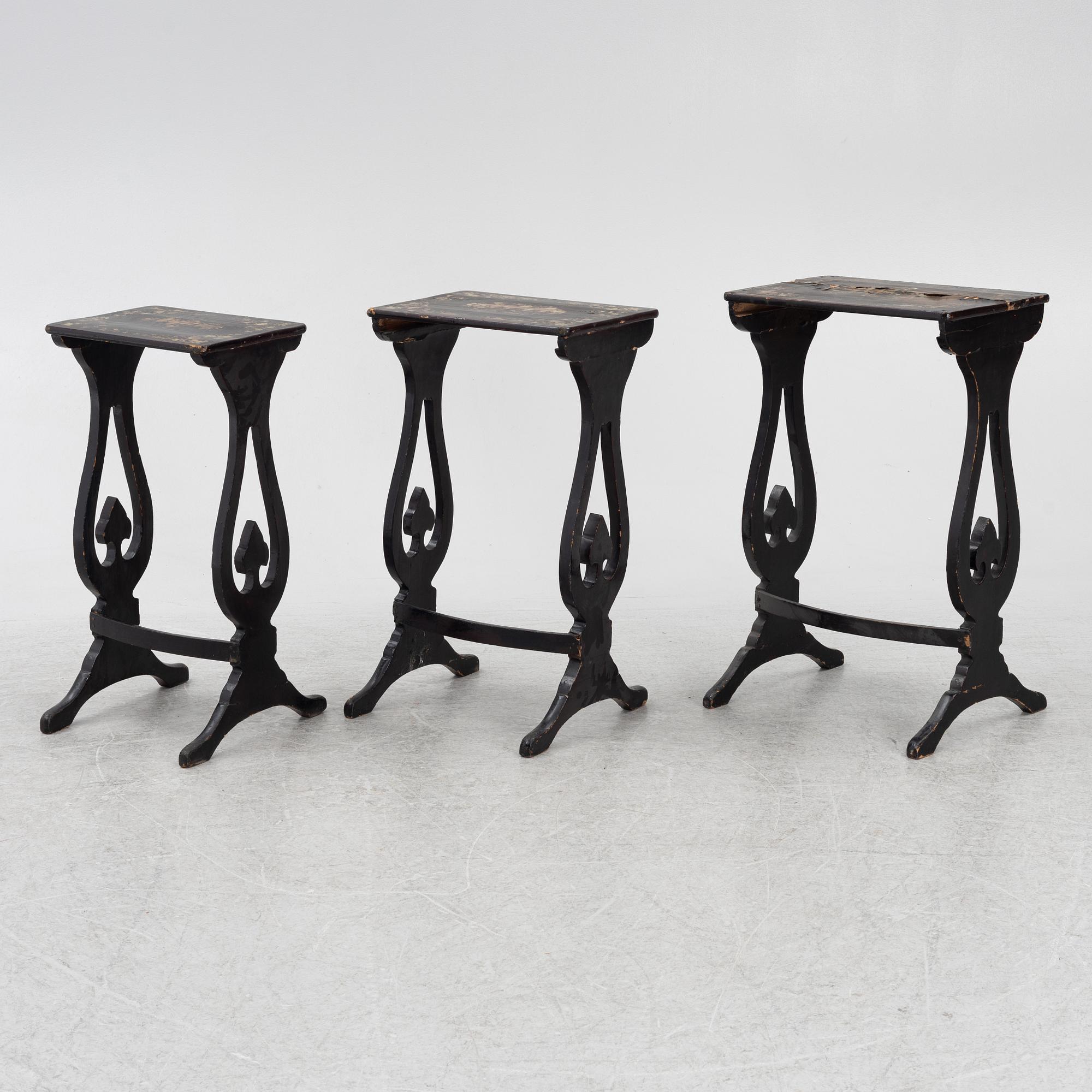 A lacquered nesting table, around 1900.