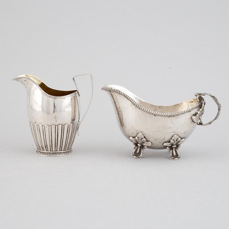 Two creamers, silver, one german and one Johan Petter Grönvall, Stockholm 1827.