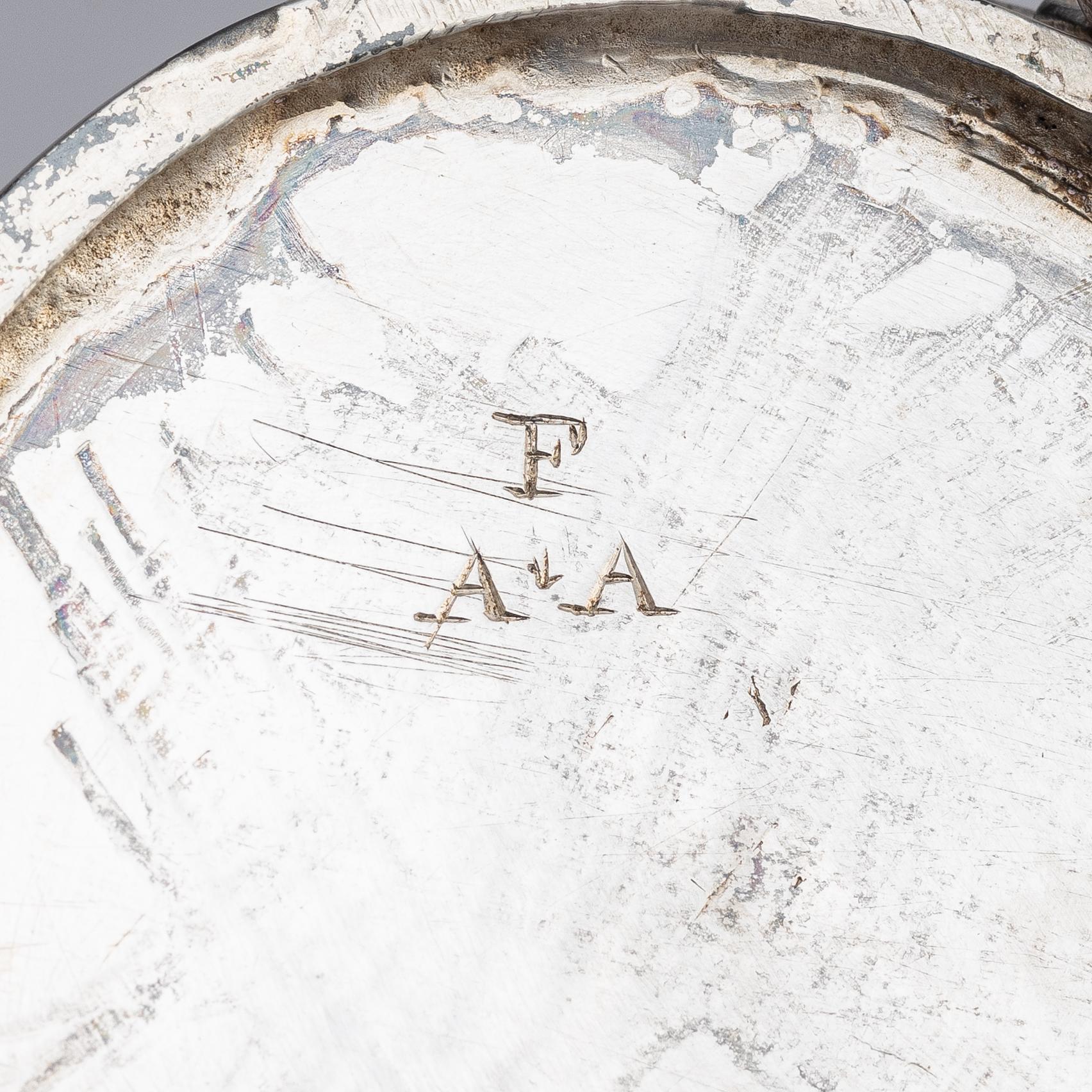 An English 18th century silver and glass cruet-set, mark of Jabez Daniel, London 1777 and possibly 1783.