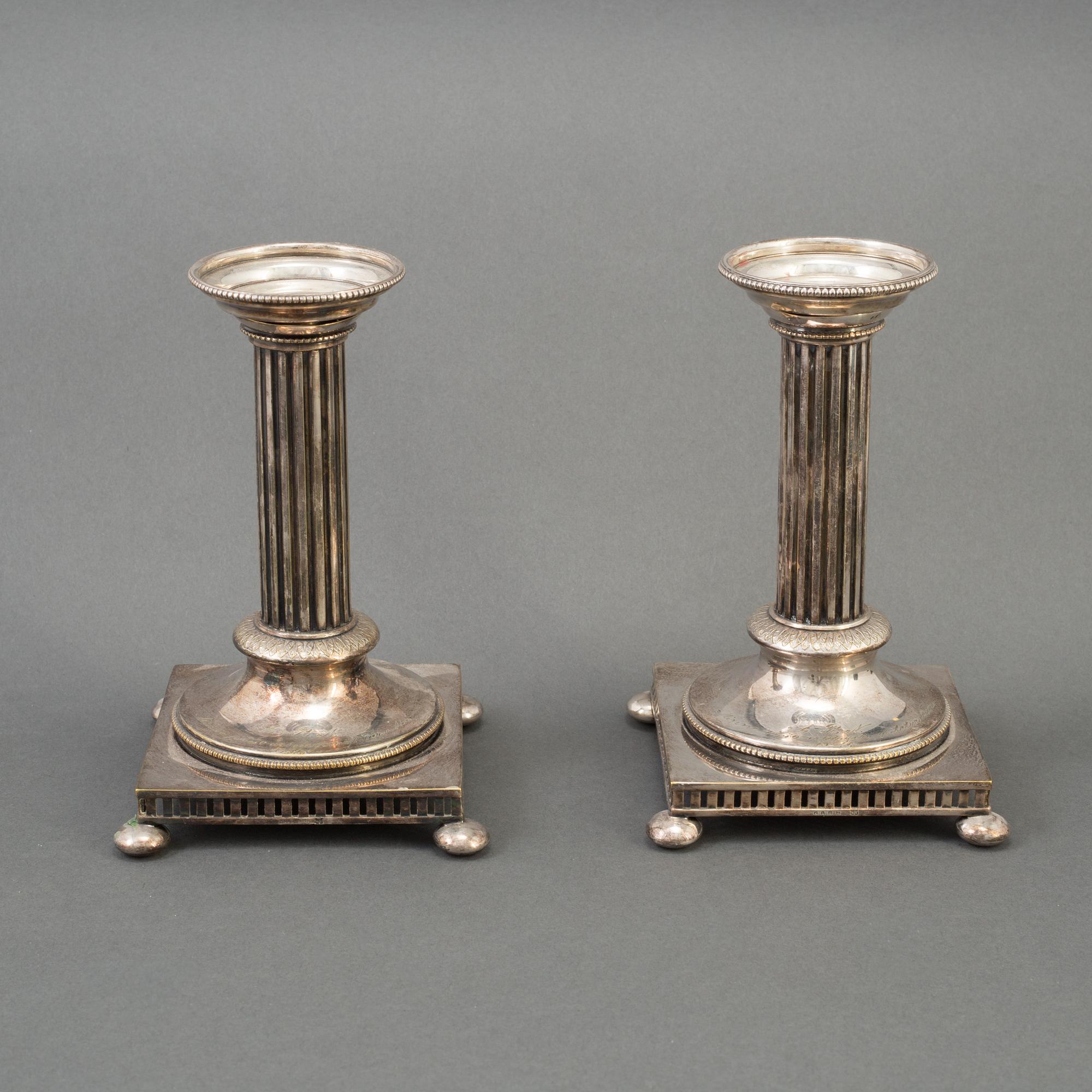 GULDSMEDSAKTIEBOLAGET (GAB), Ljusstakar, nysilver, Gustaviansk stil, 1900-talets första hälft.